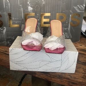 Rhinestone and clear plastic toe out heels